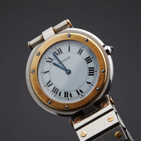 santos de cartier quartz round.